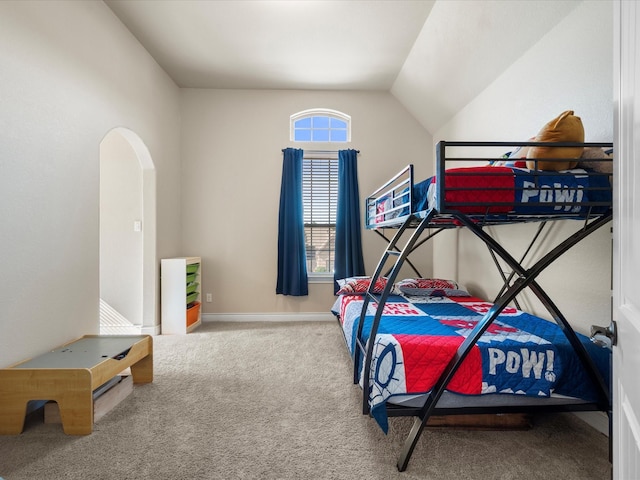 8322 Sands Bank Ln, Conroe, TX 77304 - carpeted bedroom with vaulted ceiling and baseboards