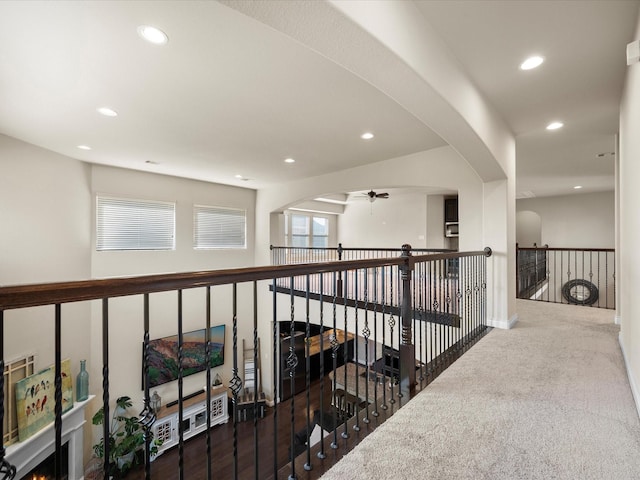 8322 Sands Bank Ln, Conroe, TX 77304 - hall featuring recessed lighting, arched walkways, carpet flooring, and plenty of natural light