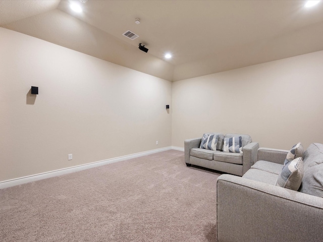 8322 Sands Bank Ln, Conroe, TX 77304 - living room featuring light carpet, baseboards, lofted ceiling, and recessed lighting