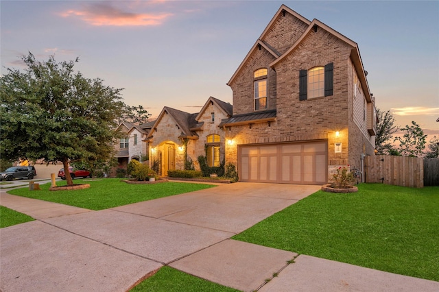 8322 Sands Bank Ln, Conroe, TX 77304 - view of front of property featuring an attached garage, stone siding, a standing seam roof, and driveway