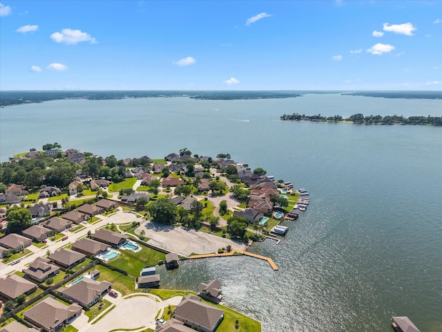 8322 Sands Bank Ln, Conroe, TX 77304 - aerial perspective of suburban area with a nearby body of water