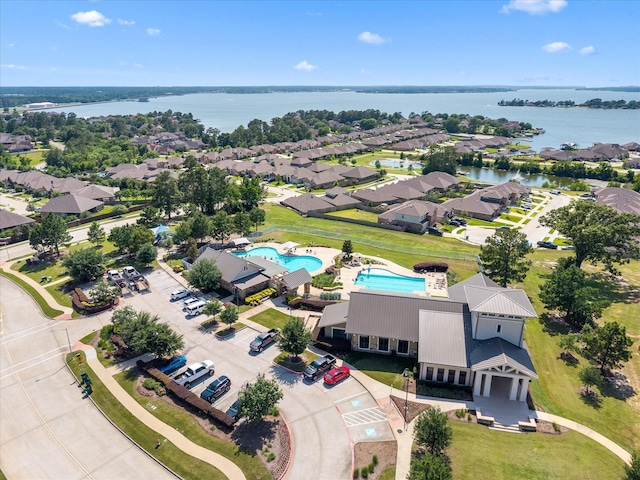 8322 Sands Bank Ln, Conroe, TX 77304 - aerial view of residential area featuring a pool and a nearby body of water