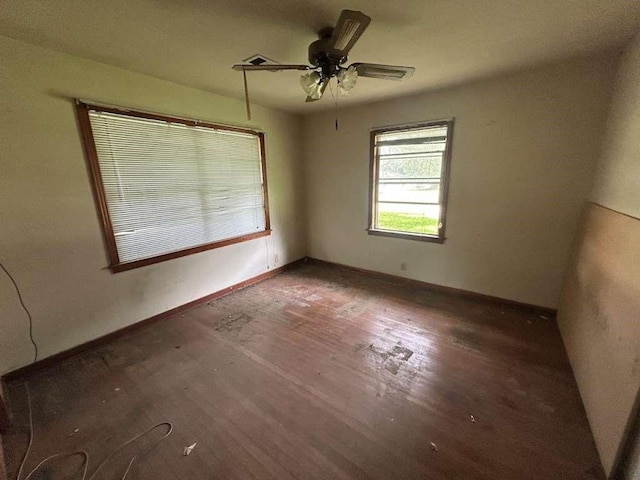 3429 Graves Ave, Groves, TX 77619 - unfurnished room featuring wood finished floors, baseboards, and ceiling fan