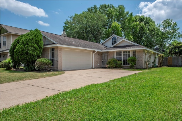 4035 Green Crst, Houston, TX 77082 - view of front of property with brick siding, a garage, driveway, and roof with shingles
