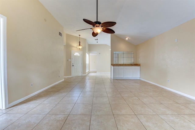 4035 Green Crst, Houston, TX 77082 - unfurnished living room featuring a ceiling fan, lofted ceiling, light tile patterned floors, and baseboards