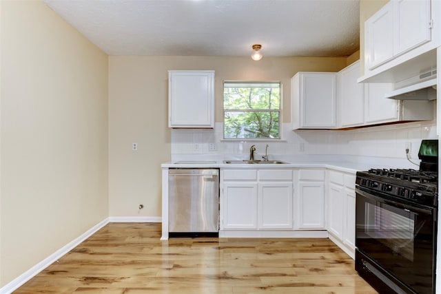 4035 Green Crst, Houston, TX 77082 - kitchen with black range with gas stovetop, stainless steel dishwasher, a sink, tasteful backsplash, and light countertops