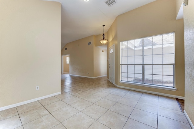 4035 Green Crst, Houston, TX 77082 - spare room with vaulted ceiling, healthy amount of natural light, light tile patterned floors, baseboards, and a smoke detector