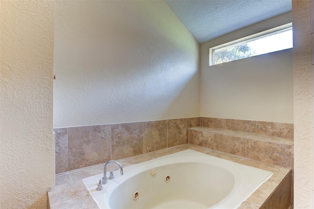 4035 Green Crst, Houston, TX 77082 - full bath with a textured wall, a whirlpool tub, and a textured ceiling