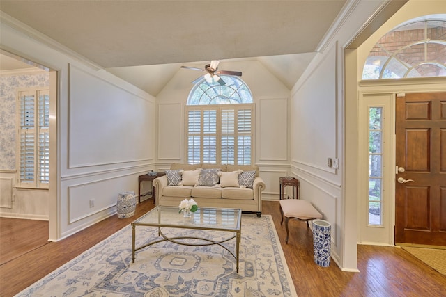 26 E Sterling Pond Cir, The Woodlands, TX 77382 - living room with a decorative wall, ceiling fan, wood finished floors, and vaulted ceiling