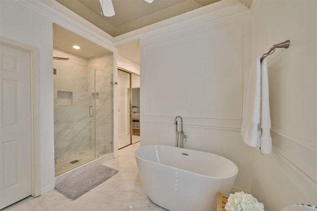 26 E Sterling Pond Cir, The Woodlands, TX 77382 - bathroom with a marble finish shower, a soaking tub, a ceiling fan, and ornamental molding