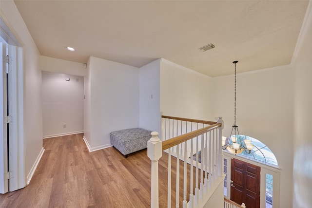 26 E Sterling Pond Cir, The Woodlands, TX 77382 - foyer entrance featuring a chandelier, light wood finished floors, baseboards, and recessed lighting