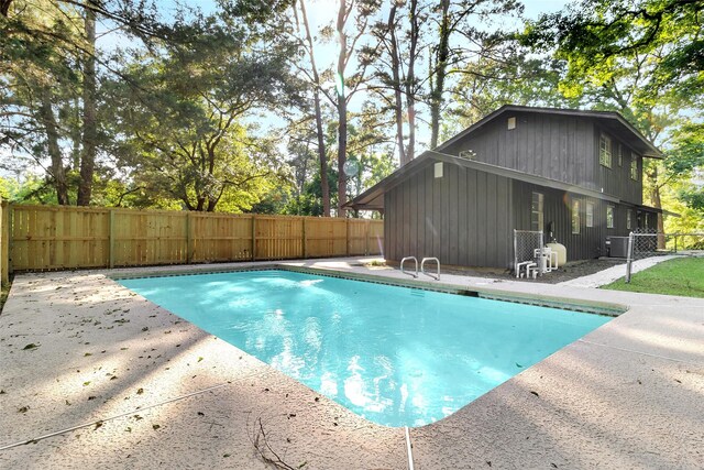 118 Glenview, Livingston, TX 77351 - view of pool featuring a patio and a fenced backyard