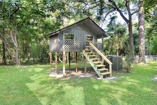 118 Glenview, Livingston, TX 77351 - view of outbuilding featuring stairway
