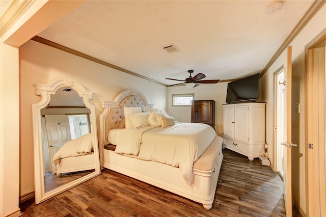 4603 New Orleans St, Houston, TX 77020 - bedroom featuring dark wood-style floors, ornamental molding, a ceiling fan, and baseboards