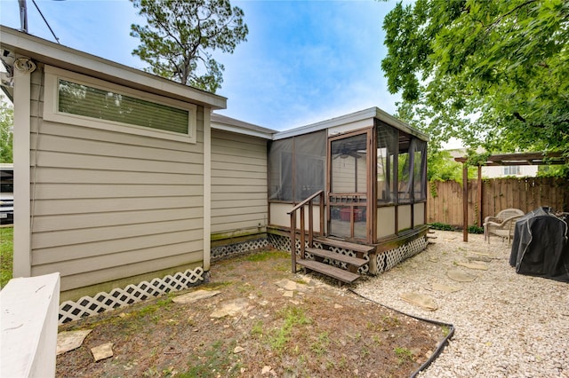 4603 New Orleans St, Houston, TX 77020 - back of house featuring entry steps and a sunroom