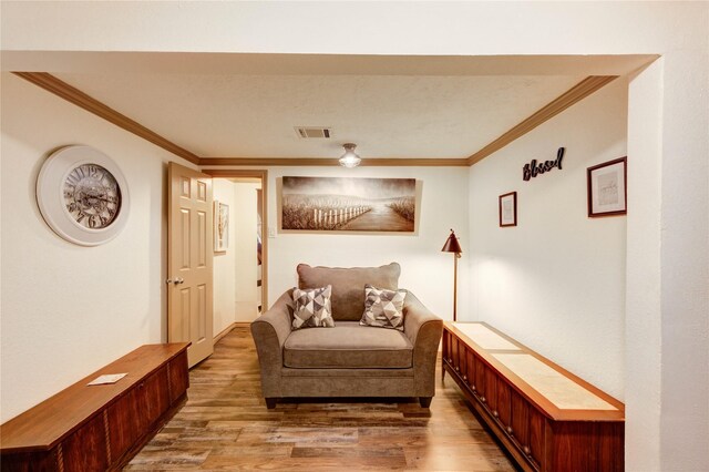 4603 New Orleans St, Houston, TX 77020 - living area with ornamental molding and light wood-type flooring