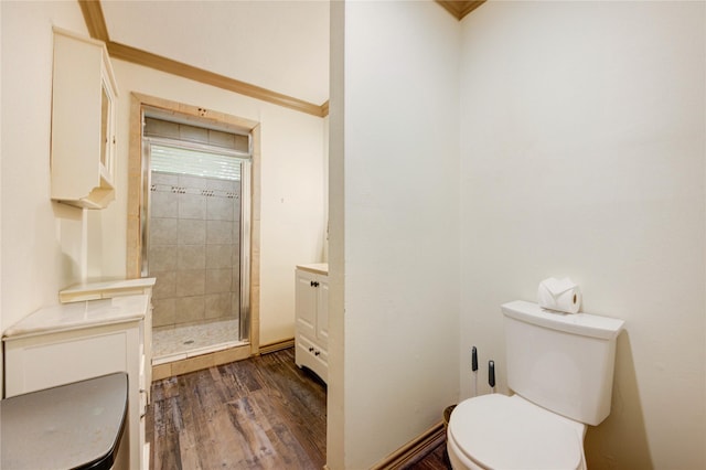 4603 New Orleans St, Houston, TX 77020 - full bathroom featuring toilet, vanity, wood finished floors, a stall shower, and ornamental molding