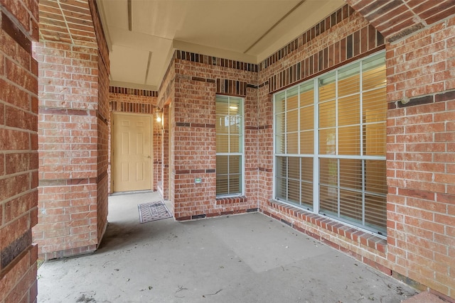2815 Kings Crossing Dr Unit 102, Houston, TX 77345 - doorway to property with brick siding