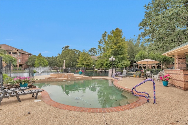 2815 Kings Crossing Dr Unit 102, Houston, TX 77345 - community pool with a patio