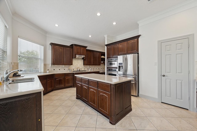 3505 Parkside Dr, Pearland, TX 77584 - kitchen featuring stainless steel refrigerator with ice dispenser, a sink, a center island, crown molding, and gas stovetop