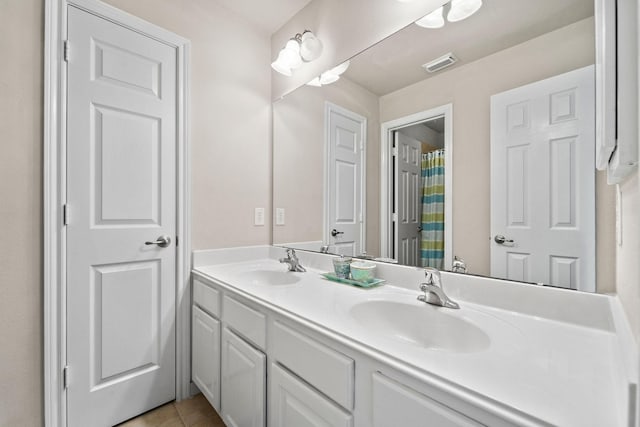 22610 Torrisdale Ln, Tomball, TX 77375 - full bathroom featuring double vanity and tile patterned flooring