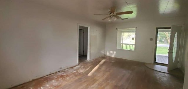 6136 25th St, Groves, TX 77619 - spare room with ceiling fan and wood finished floors