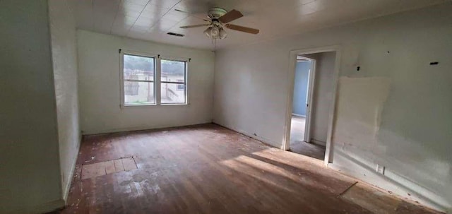 6136 25th St, Groves, TX 77619 - empty room featuring wood finished floors and ceiling fan