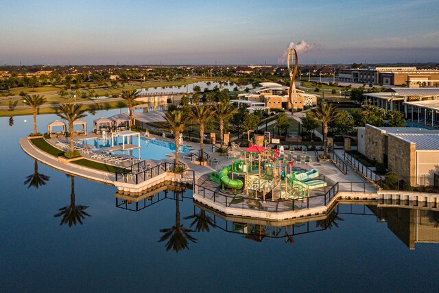 4110 Watson Dr, Rosharon, TX 77583 - aerial view at dusk of a water view