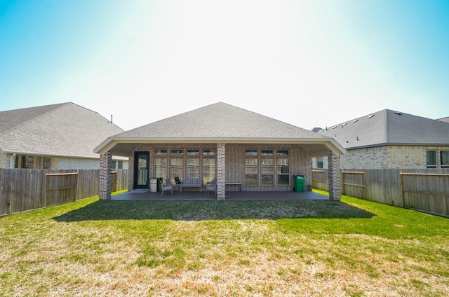 10711 Kingston Spring Dr, Missouri City, TX 77459 - back of property featuring a patio area and brick siding