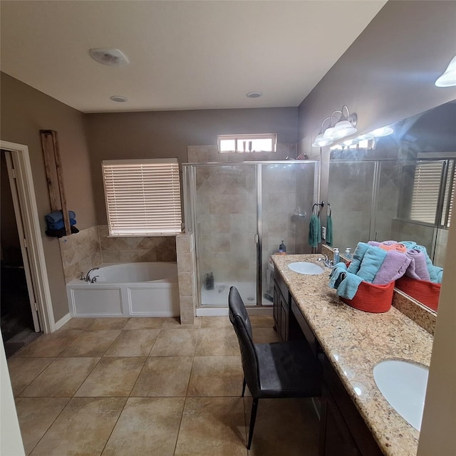6110 Watford Bnd, Rosenberg, TX 77471 - bathroom featuring double vanity, a stall shower, tile patterned flooring, and a garden tub