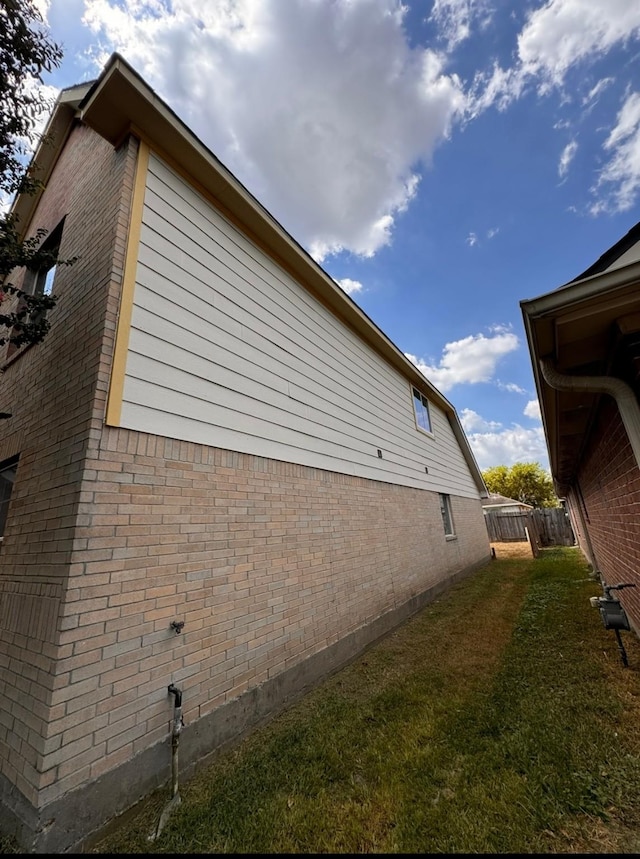 8114 Golden Trace Ct, Houston, TX 77083 - view of side of home featuring brick siding