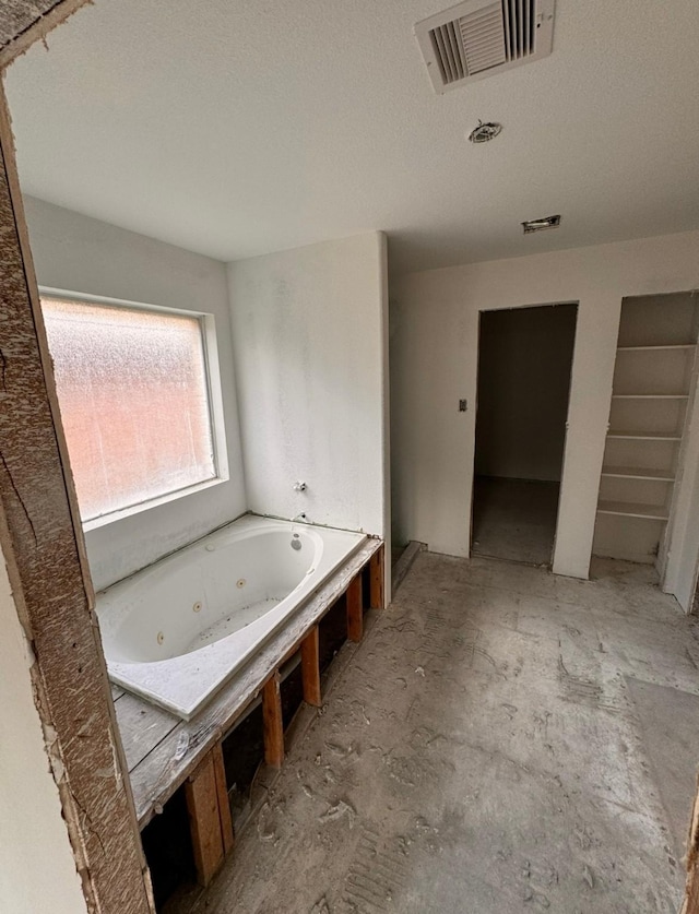 8114 Golden Trace Ct, Houston, TX 77083 - bathroom featuring a whirlpool tub