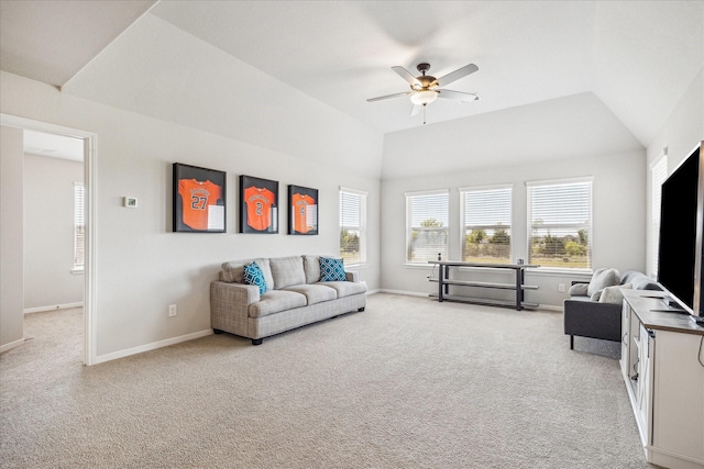 1861 Kenley Way, Alvin, TX 77511 - living room featuring a ceiling fan, light colored carpet, baseboards, and lofted ceiling