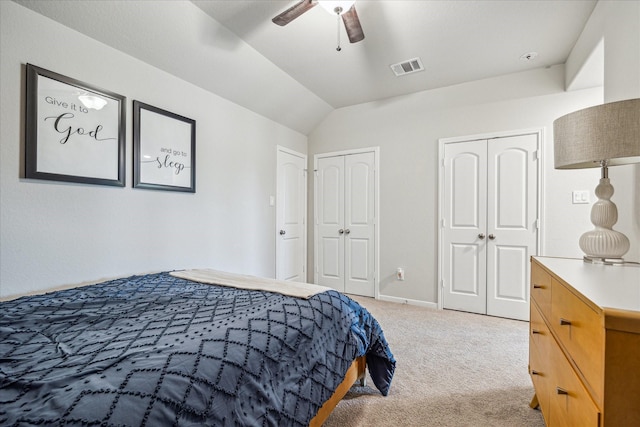 1861 Kenley Way, Alvin, TX 77511 - bedroom with multiple closets, light colored carpet, lofted ceiling, ceiling fan, and baseboards