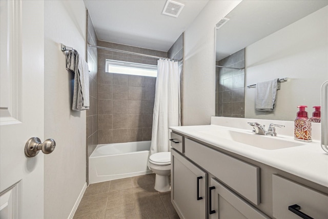 1861 Kenley Way, Alvin, TX 77511 - bathroom with toilet, vanity, shower / bath combo with shower curtain, tile patterned floors, and baseboards