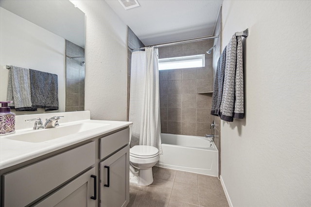 1861 Kenley Way, Alvin, TX 77511 - full bath with toilet, vanity, shower / tub combo, tile patterned flooring, and baseboards