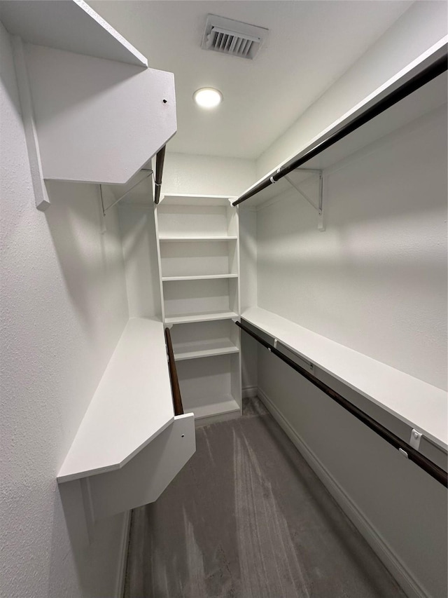 21207 Rushing Creek Ln, Katy, TX 77449 - spacious closet with dark colored carpet