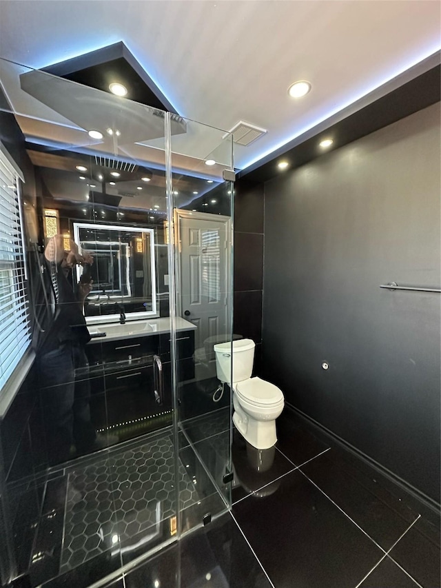 21207 Rushing Creek Ln, Katy, TX 77449 - bathroom with toilet, a shower stall, tile patterned flooring, recessed lighting, and vanity