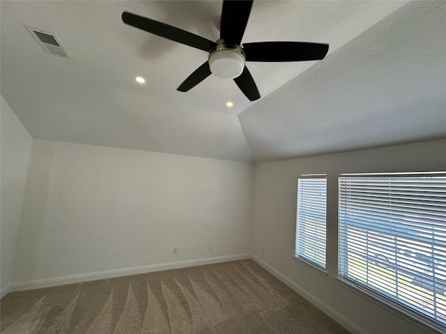 21207 Rushing Creek Ln, Katy, TX 77449 - empty room featuring carpet, baseboards, lofted ceiling, recessed lighting, and ceiling fan