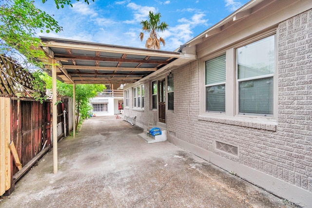 8209 Howard Dr, Houston, TX 77017 - view of patio / terrace featuring a carport