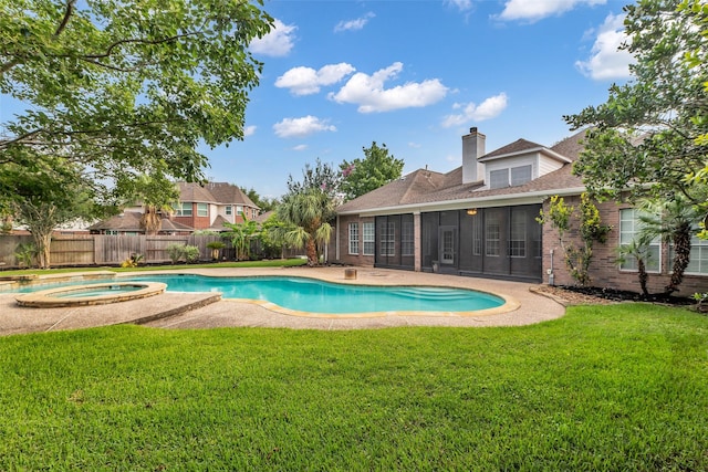 1930 Crisfield Dr, Sugar Land, TX 77479 - view of pool featuring a sunroom, a patio area, and a pool with connected hot tub