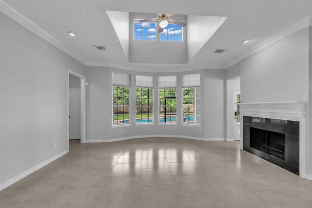 1930 Crisfield Dr, Sugar Land, TX 77479 - unfurnished living room featuring ceiling fan, crown molding, light tile patterned floors, a fireplace, and a raised ceiling
