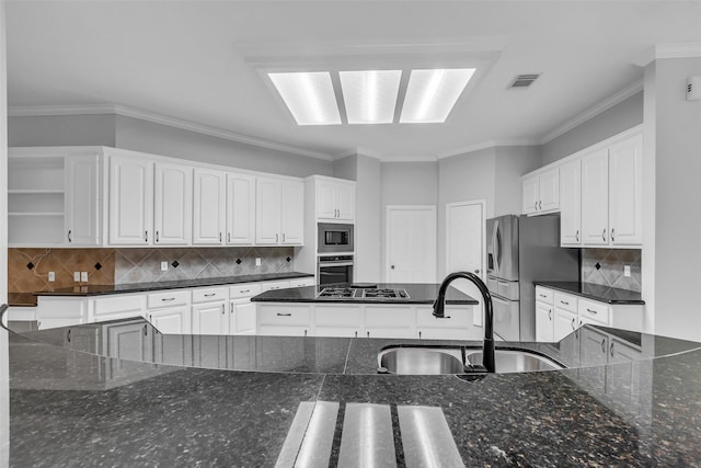 1930 Crisfield Dr, Sugar Land, TX 77479 - kitchen with a sink, appliances with stainless steel finishes, open shelves, white cabinetry, and crown molding