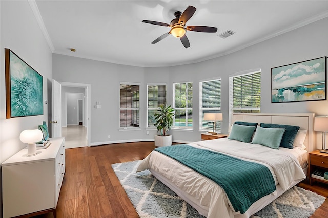 1930 Crisfield Dr, Sugar Land, TX 77479 - bedroom with crown molding, wood finished floors, a ceiling fan, and baseboards