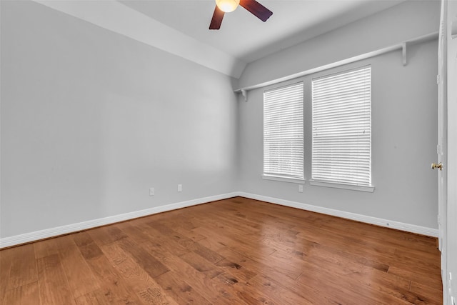 1930 Crisfield Dr, Sugar Land, TX 77479 - empty room with ceiling fan, baseboards, lofted ceiling, and wood finished floors