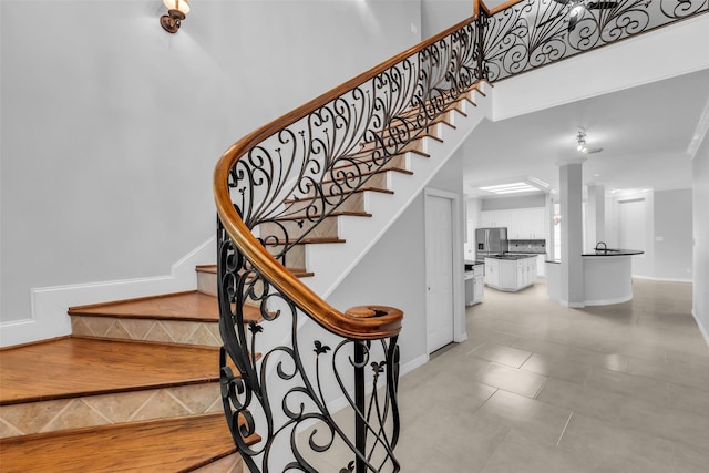 1930 Crisfield Dr, Sugar Land, TX 77479 - staircase with baseboards and tile patterned flooring