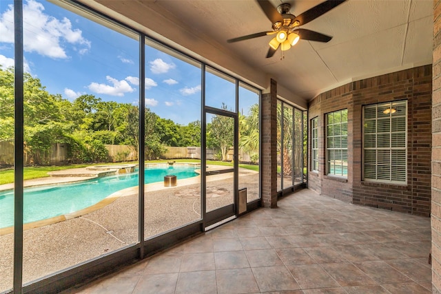 1930 Crisfield Dr, Sugar Land, TX 77479 - unfurnished sunroom featuring ceiling fan, plenty of natural light, and lofted ceiling