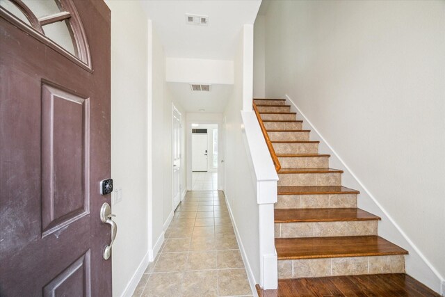 2402 Calumet St Unit C, Houston, TX 77004 - tiled foyer entrance with stairway and baseboards