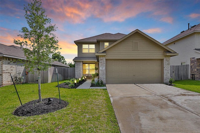 317 Riverwood Village Ln, Sealy, TX 77474 - traditional home with driveway, an attached garage, and brick siding