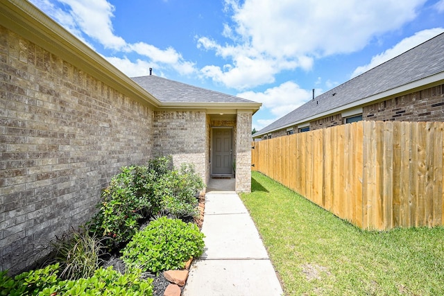 10130 Barn Owl Trl, Magnolia, TX 77354 - entrance to property with brick siding and a shingled roof